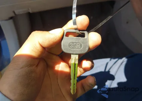 2002 Toyota Corolla Le из США, поврежденный, VIN 2T1BR12E52C558044